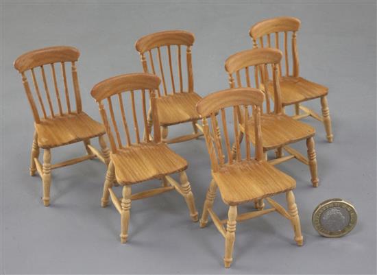 Denis Hillman. A set of six miniature Victorian style beech kitchen dining chairs, heights 2 7/8in.